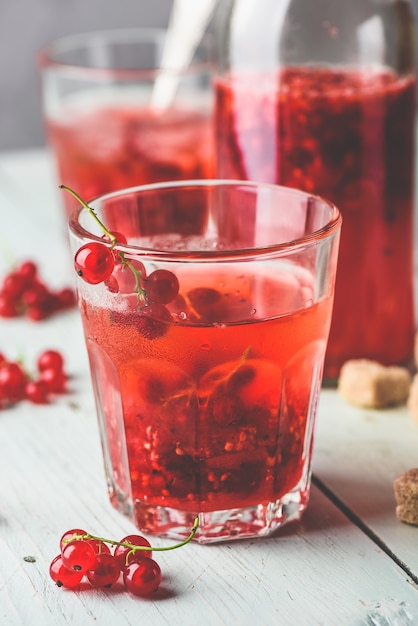 Infused water with fresh red currant and cane sugar