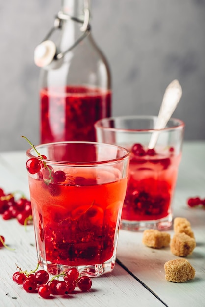 Infused water with red currant and sugar