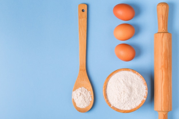 Ingredients for baking on a blue background