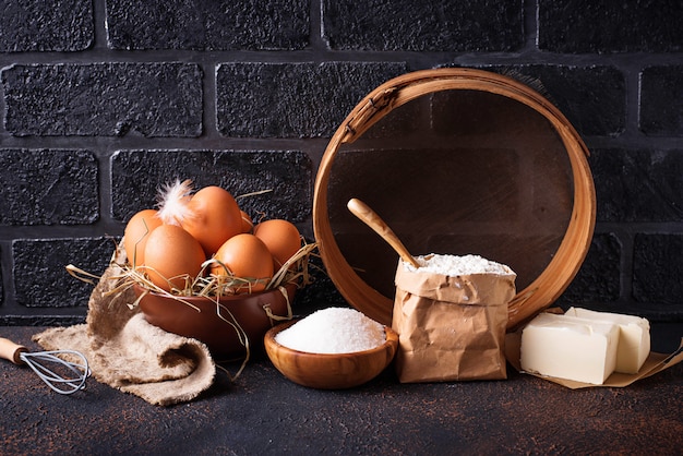 Ingredients for baking. Butter, eggs, sugar and flour 