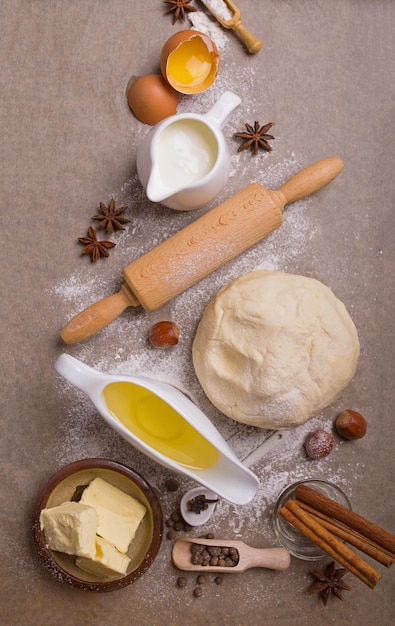 The ingredients for baking cupcake with raisins.