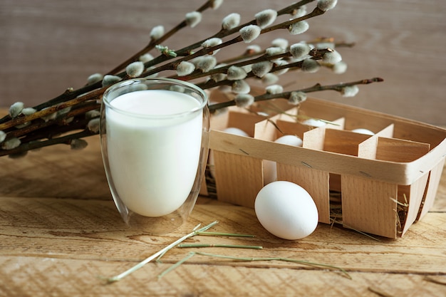 Ingredients for baking Easter cake on wooden background