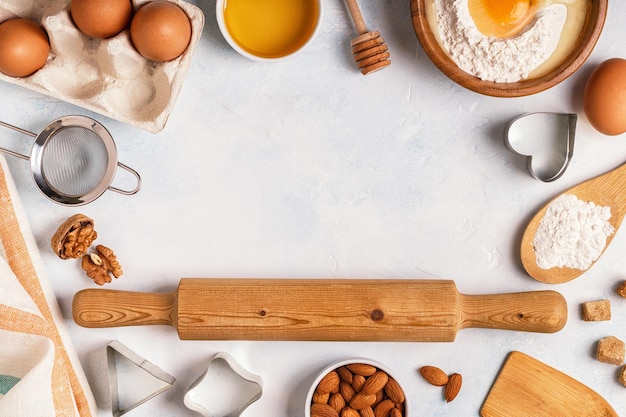 Ingredients for baking flour wooden spoon eggs