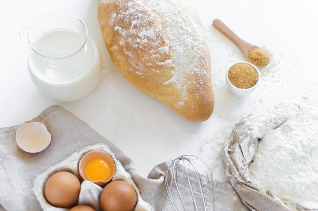 Ingredients for baking homemade bread. Eggs, milk, flour. 