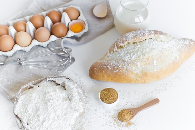 Ingredients for baking homemade bread. Eggs, milk, flour. 