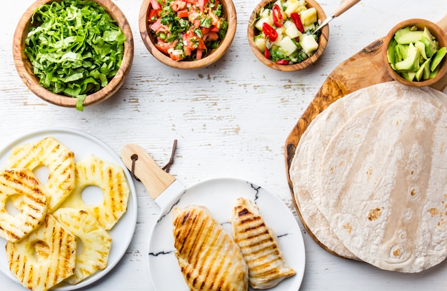 Ingredients for chicken tacos with grilled pineapple