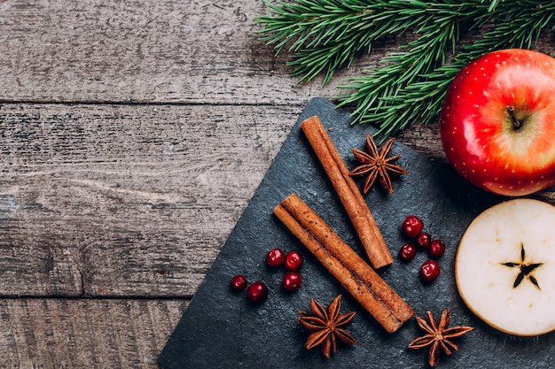 Ingredients for cooking apple and spices hot mulled wine. Christmas Holiday Drink Concept