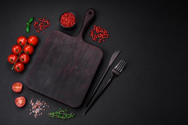 Ingredients for cooking cherry tomatoes salt spices and herbs