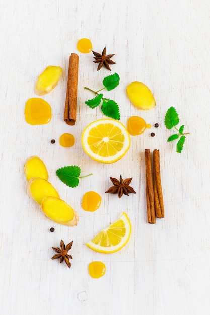 Ingredients for ginger drink on a white background, top view