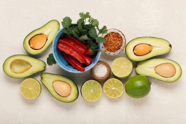 Ingredients guacamole avocado and lime, chili pepper and cilantro