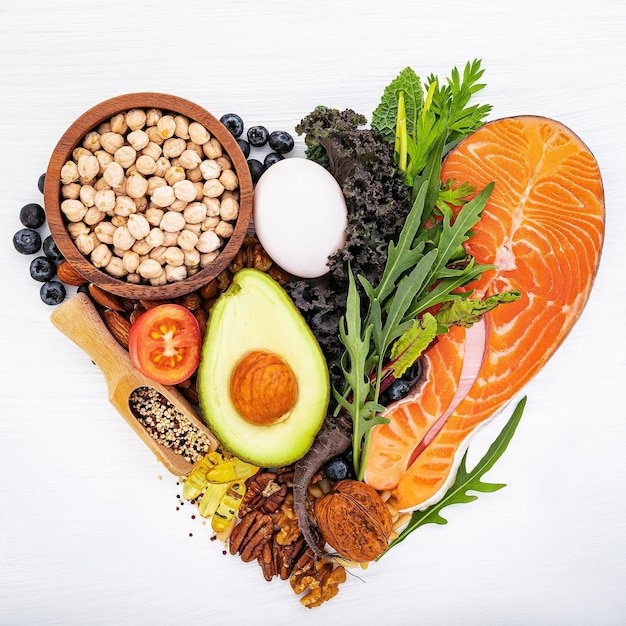 Ingredients for healthy foods selection on white wooden background