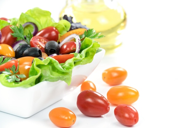 Ingredients of healthy vegetable lettuce lettuce olive oil olives tomatoes onion parsley