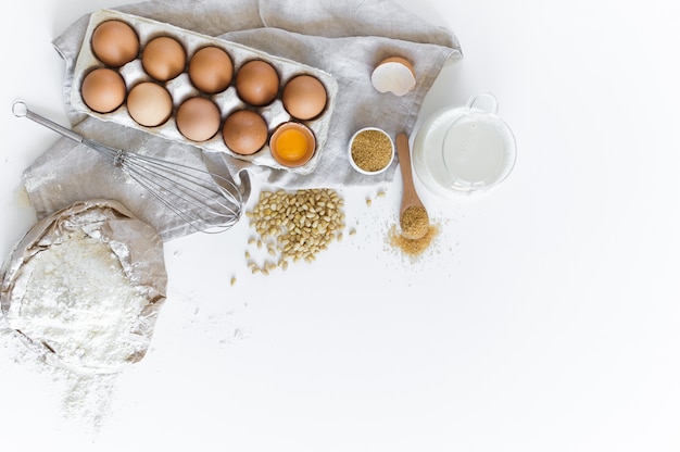 Ingredients for homemade baking. Eggs, milk, flour, sugar. 