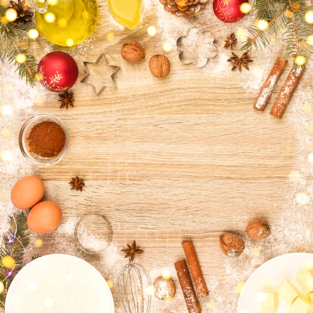 Ingredients for New Year's cookies flour eggs butter sugar on a wooden table Place for text View from above