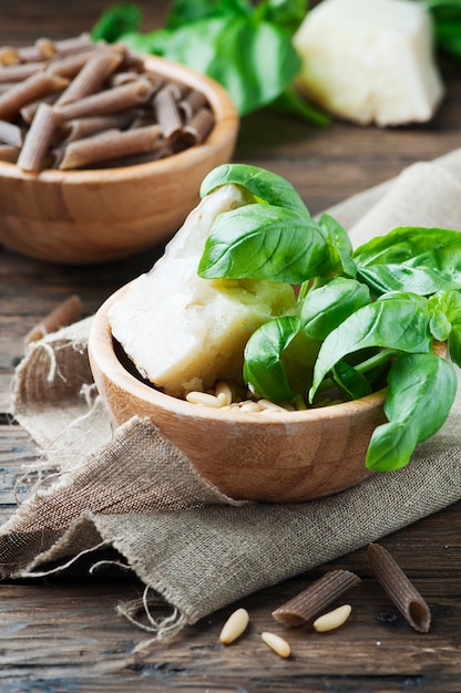 Ingredients for pasta with pesto with basil and cheese