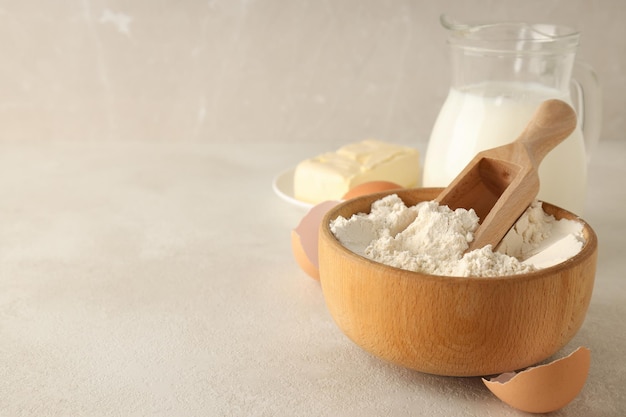 Ingredients for pie or cake cooking on light textured table