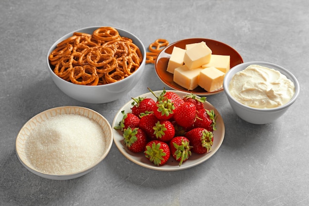 Ingredients for strawberry pretzel salad on table