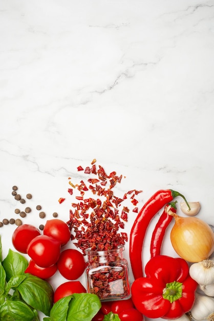 Ingredients for tomato sauce Culinary background with spices and tomato sauce