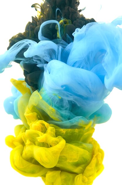 Ink in water. Splash paint mixing. Multicolored liquid dye. Abstract  sculpture background color