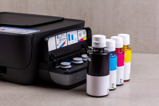 Photo inkjet four-color printer with continuous ink supply and ink bottles for refilling