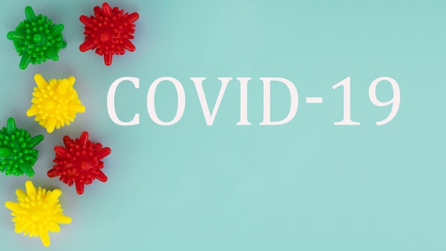 Inscription COVID19 on blue background Coronavirus disease named COVID19