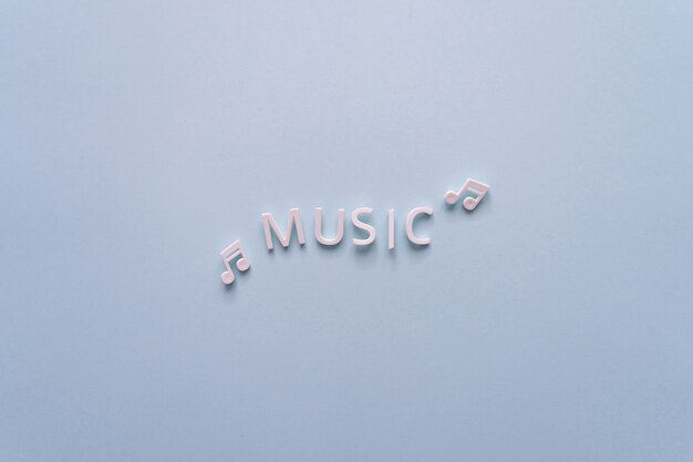 Inscription music from letters isolated on blue