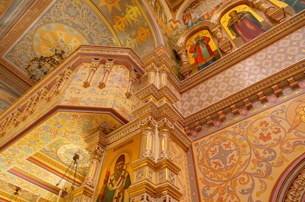 Inside of the All Hallows Church's dome with mural paintings