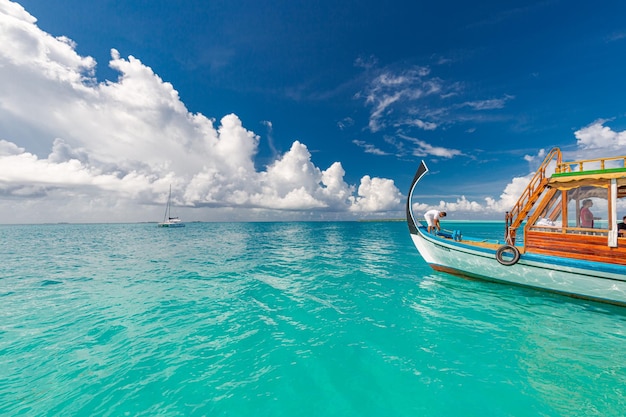 Inspirational Maldives travel beach wallpaper, traditional boat Dhoni, perfect blue sea with lagoon