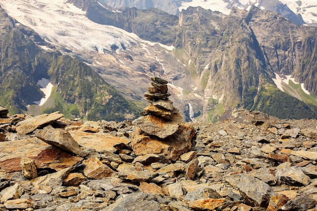 installation of mountain stones on the background of mountains