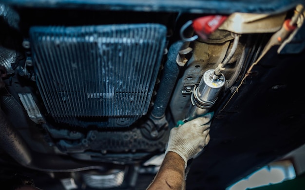 installing a fuel filter on the bottom of the car