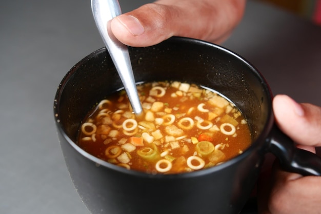 Instant cup soup in a mug on table