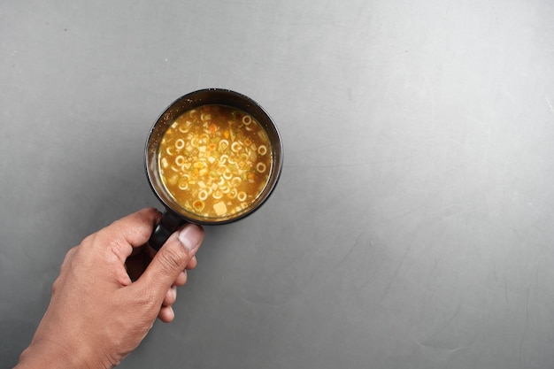 Instant cup soup in a mug on table