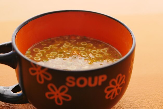 Instant cup soup in a mug on table