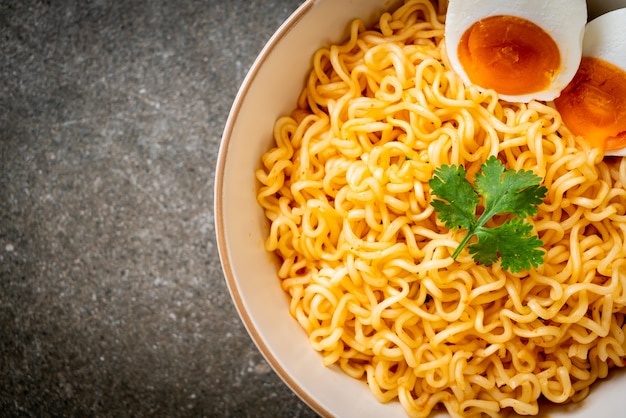 instant noodles bowl with salt egg