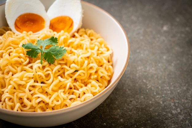 instant noodles bowl with salt egg