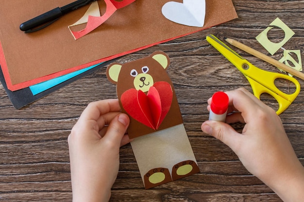 Instruction step 11 On Mothers Day or Valentines Day gift a teddy bear with a heartcard