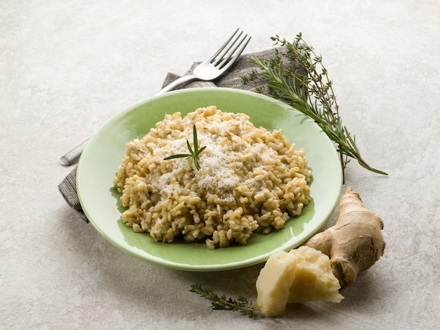 Integral risotto with ginger rosemary parmesan and gorgonzola cheese