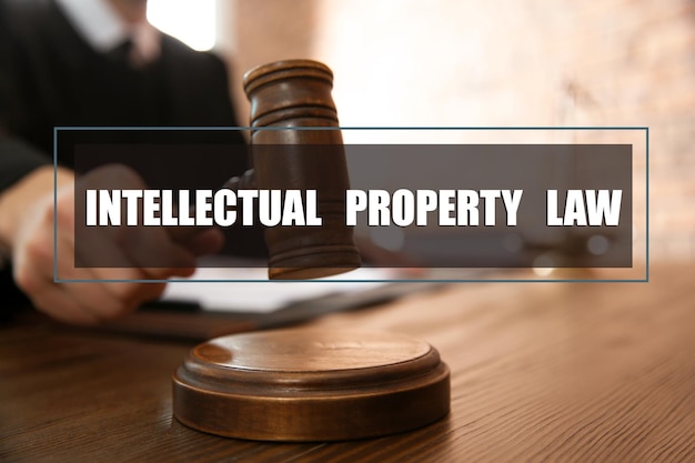 Intellectual property law Judge with gavel at table closeup