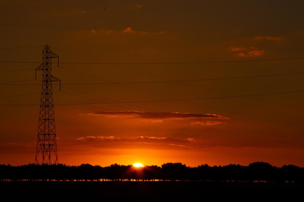 Intense sunset with electric tower as the protagonist