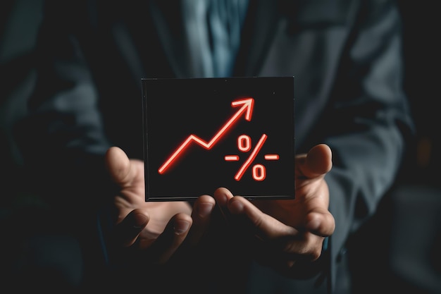 Interest rates and dividends businessman holding arrow and percentage icon with investment graph