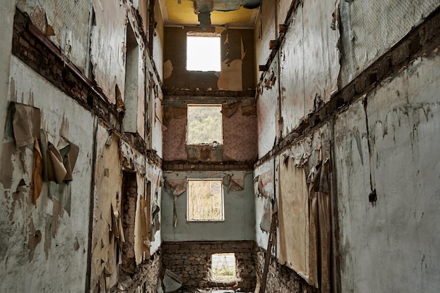 The interior of an abandoned crumbling building A dying city Frightening atmosphere