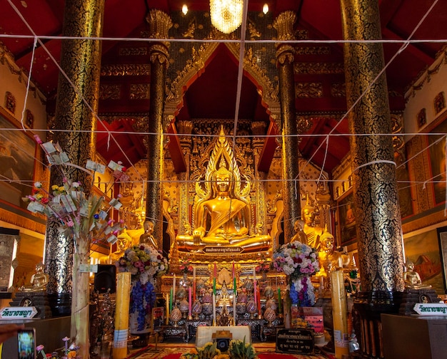 Interior of buddhist temple and statue in the northern chiang mai style