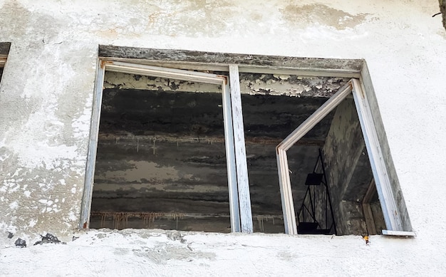 The interior of a building destroyed after hostilities fires and accidents in Ukraine Broken windows