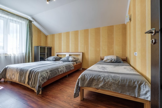 Interior of cheapest bedroom in studio apartments or hostel