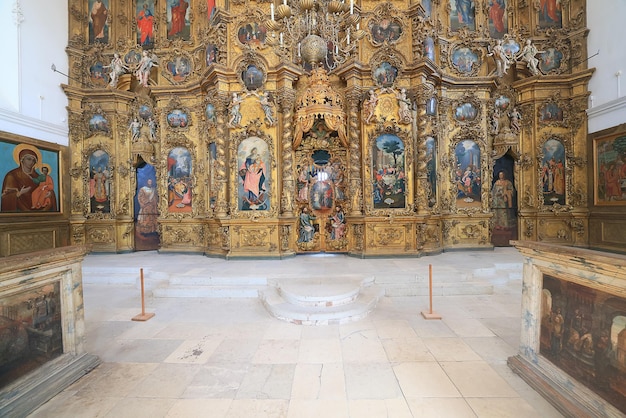 interior of the church iconostasis icons objects of worship altar religion crucifixion