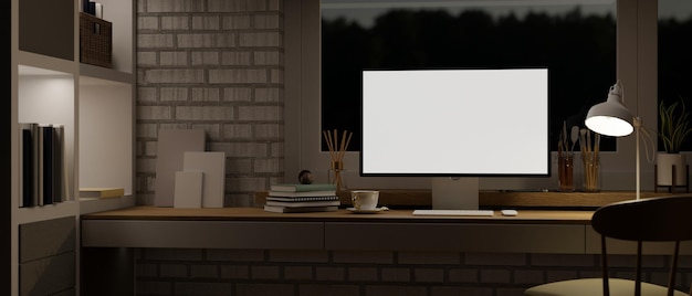 Interior design of a comfortable home workspace at night with computer mockup