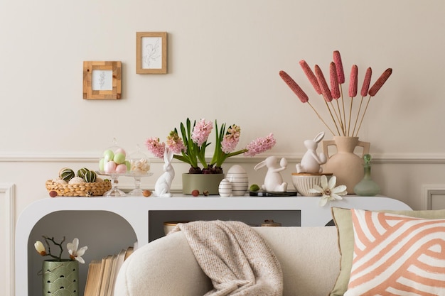 Interior design of easter living room interior with mock up poster frame stylish white sideboard