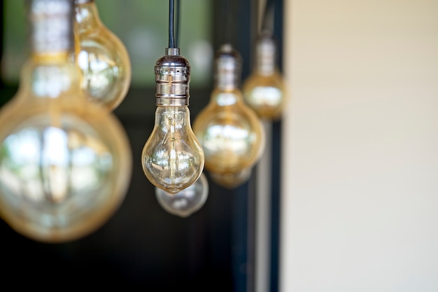 Interior design of lamp. Decorative antique style filament light bulbs hanging. 