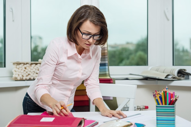 Interior designer at workplace in the office