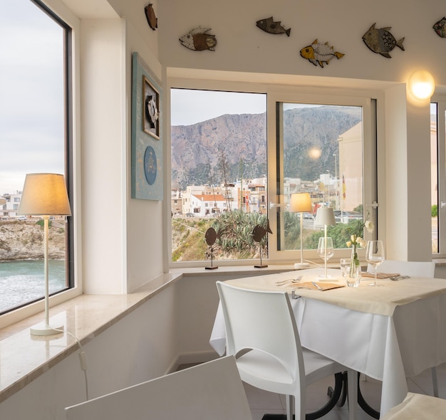 Interior of an elegant Italian restaurant with sea view